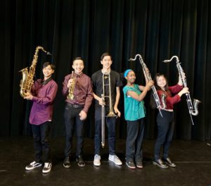 kids standing with instruments